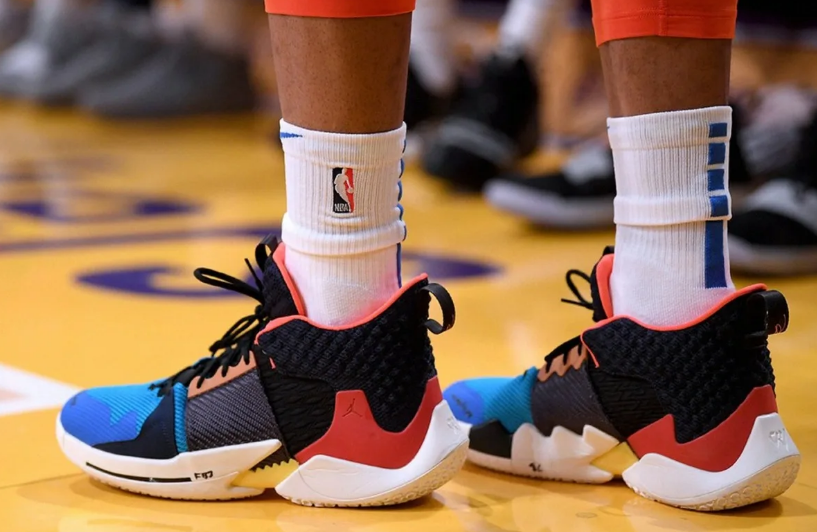 How should you style your new orange and black basketball shoes for both court and casual wear looks?