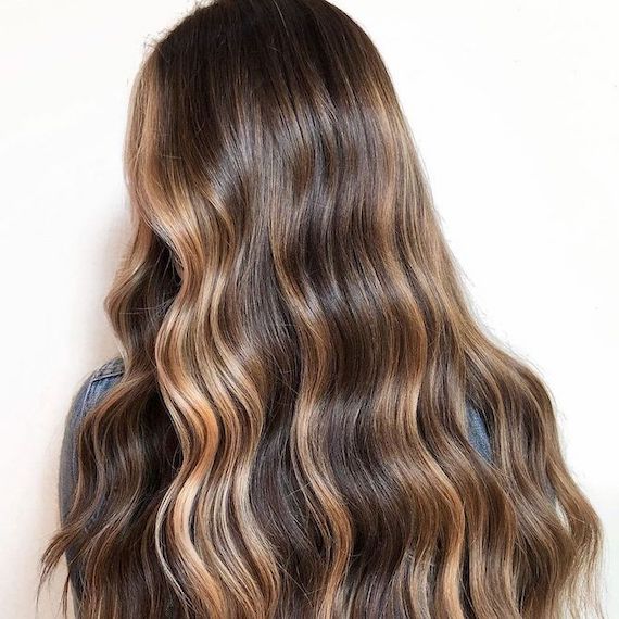 Getting perfect light brown highlights on black hair at home? Read this guide for salon quality results.