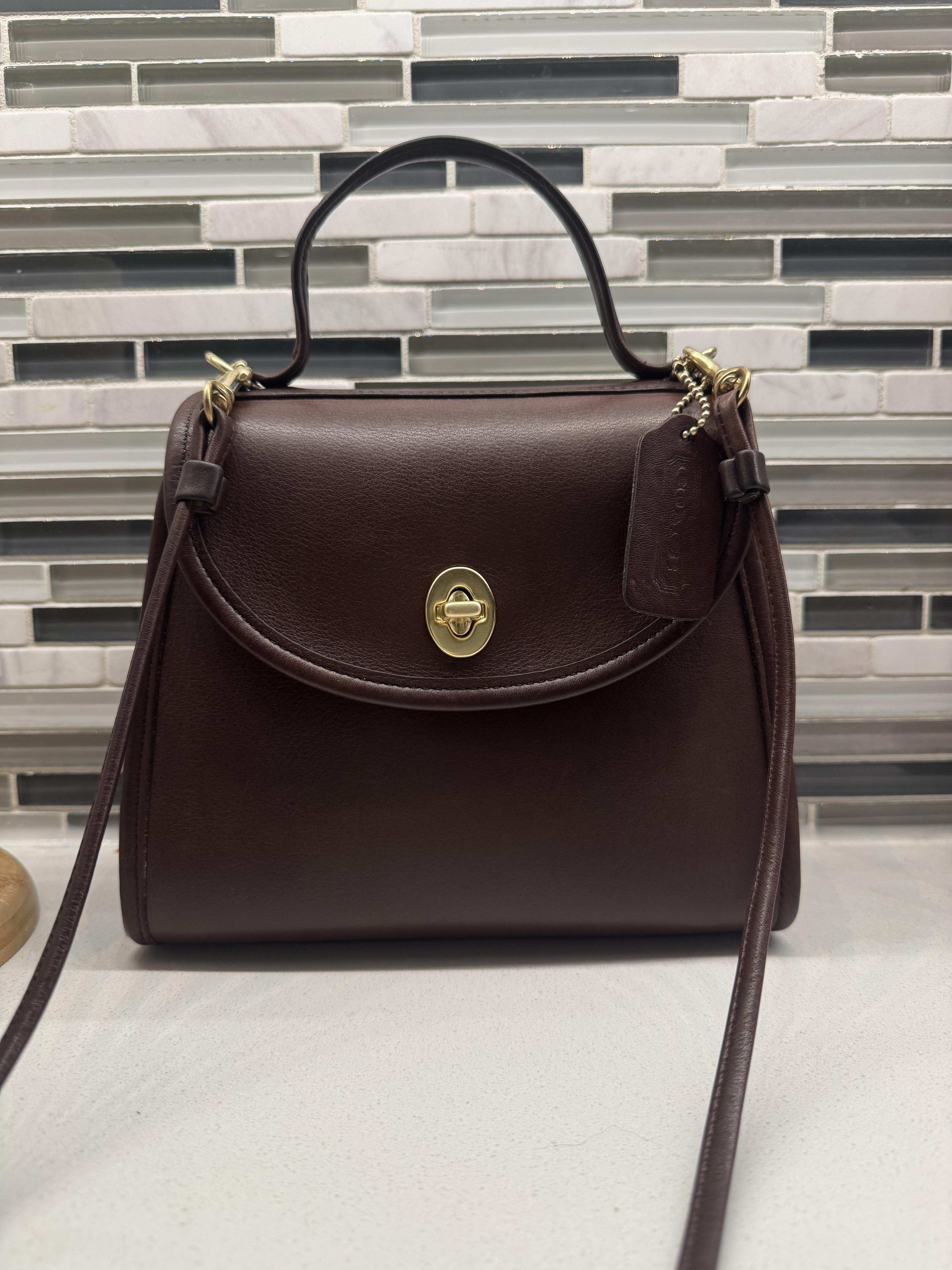 How much is a vintage coach regina taupe now? Understand its current value range.