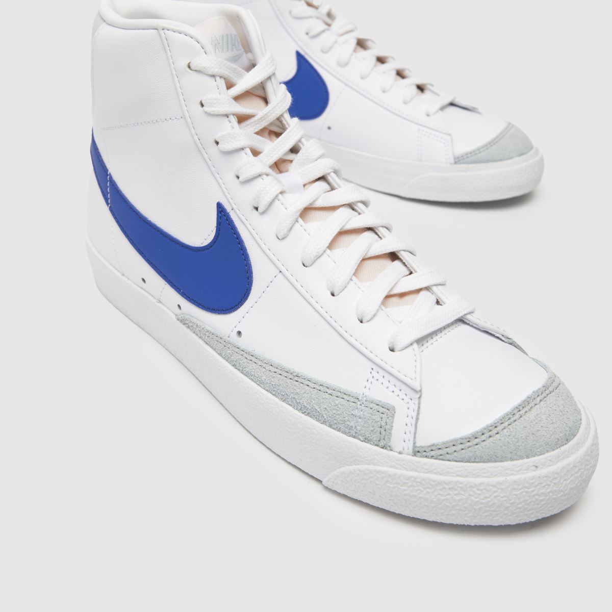 Why choose blue and white nike blazers? Learn why this classic sneaker is a must have item.