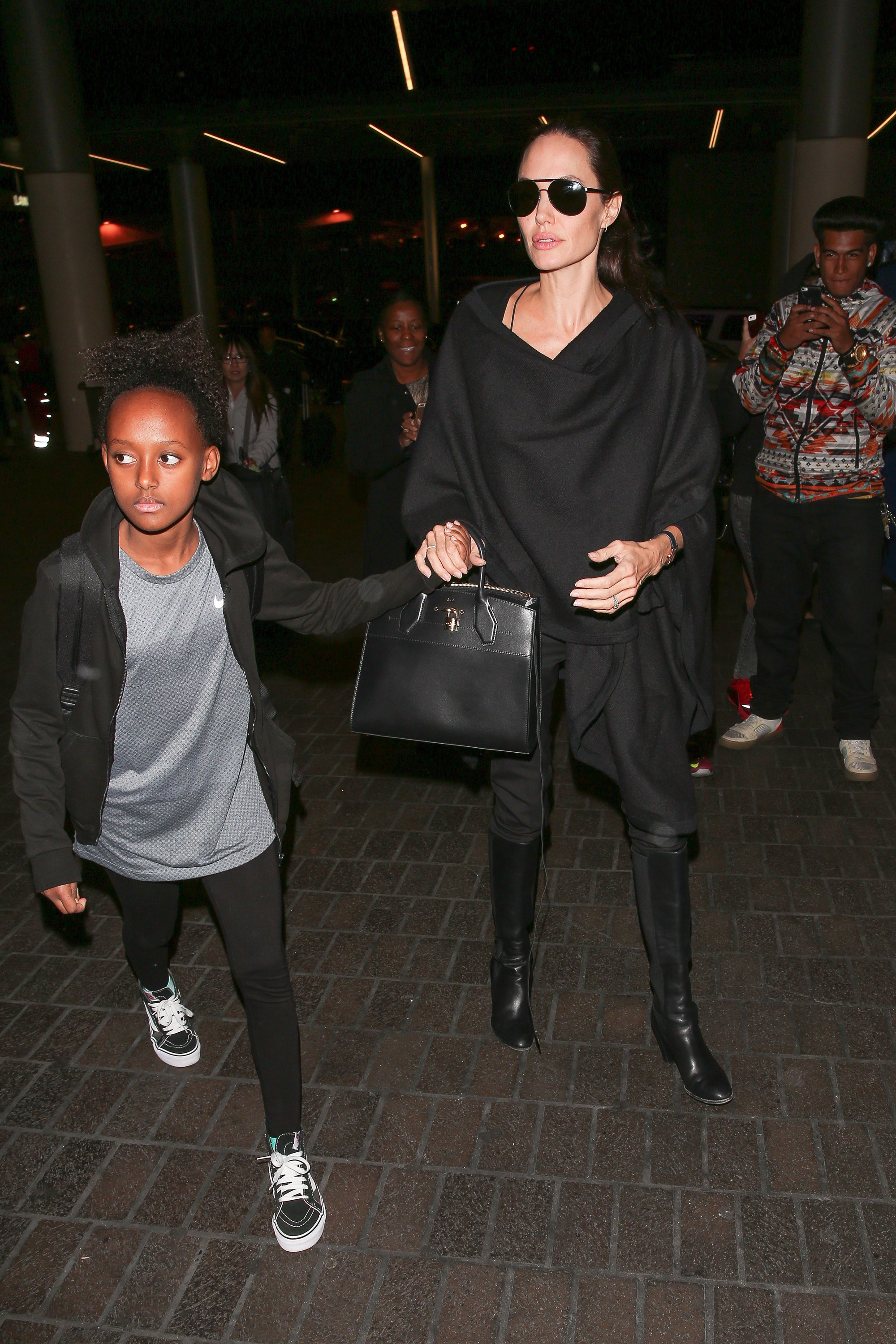 Steal Angelina Jolies style with a Louis Vuitton bag now!
