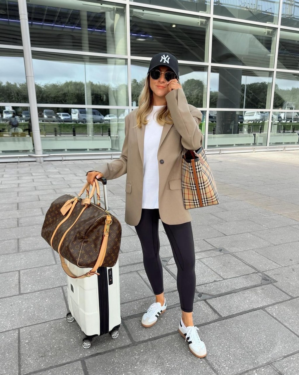 Need some easy airport outfit ideas? Here is how to dress smart and cozy for travel.